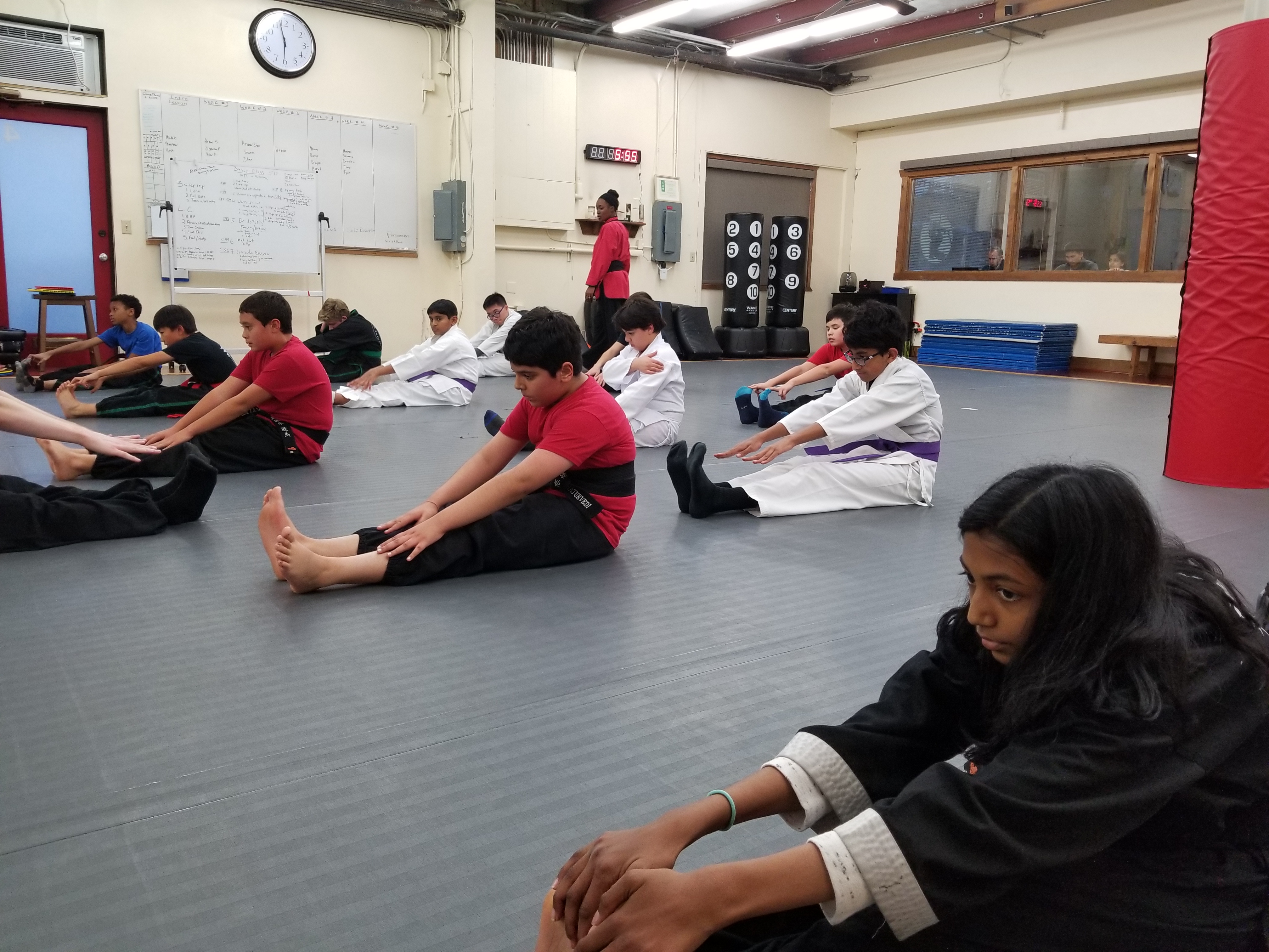 Bellevue karate for kids image of youth in stretching in karate class